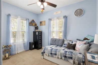 This beautifully designed stone home with blue and red accents on Lighthouse Golf Course in Texas - for sale on GolfHomes.com, golf home, golf lot
