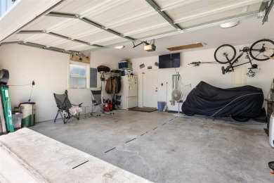 This beautifully designed stone home with blue and red accents on Lighthouse Golf Course in Texas - for sale on GolfHomes.com, golf home, golf lot