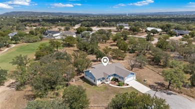 This beautifully designed stone home with blue and red accents on Lighthouse Golf Course in Texas - for sale on GolfHomes.com, golf home, golf lot