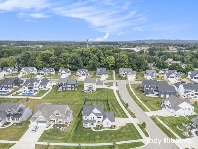 Discover your dream home in this stylish, modern farmhouse on a on Railside Golf Club in Michigan - for sale on GolfHomes.com, golf home, golf lot