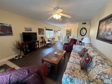 This beautifully maintained end-unit condo features two spacious on On Top Of The World Golf Course in Florida - for sale on GolfHomes.com, golf home, golf lot