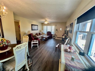 This beautifully maintained end-unit condo features two spacious on On Top Of The World Golf Course in Florida - for sale on GolfHomes.com, golf home, golf lot