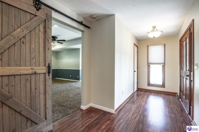 Come see what this ranch home has to offer. This home is right on Doe Valley Country Club in Kentucky - for sale on GolfHomes.com, golf home, golf lot