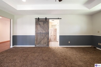 Come see what this ranch home has to offer. This home is right on Doe Valley Country Club in Kentucky - for sale on GolfHomes.com, golf home, golf lot