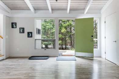 4-bedroom, 3-bath contemporary home on 1.04+/- AC overlooking on Eastman Golf Links in New Hampshire - for sale on GolfHomes.com, golf home, golf lot
