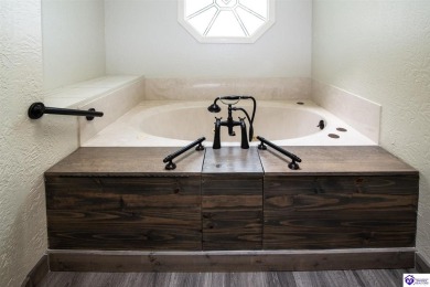 Come see what this ranch home has to offer. This home is right on Doe Valley Country Club in Kentucky - for sale on GolfHomes.com, golf home, golf lot