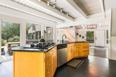 4-bedroom, 3-bath contemporary home on 1.04+/- AC overlooking on Eastman Golf Links in New Hampshire - for sale on GolfHomes.com, golf home, golf lot