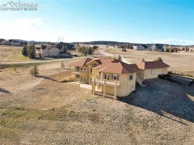Step into a realm of unmatched luxury and meticulous design in on Kings Deer Golf Club in Colorado - for sale on GolfHomes.com, golf home, golf lot
