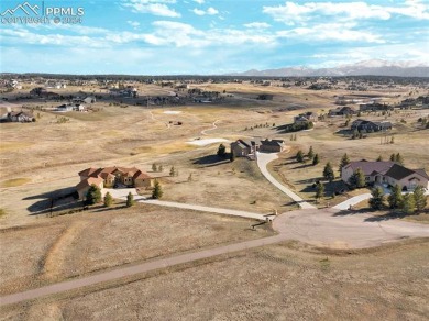 Experience unparalleled luxury in this 2.5-acre estate in the on Kings Deer Golf Club in Colorado - for sale on GolfHomes.com, golf home, golf lot