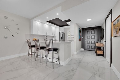 Rare fully remodeled Penthouse King model in The Oaks at Palm on Palm-Aire Country Club and Resort - The Oaks in Florida - for sale on GolfHomes.com, golf home, golf lot