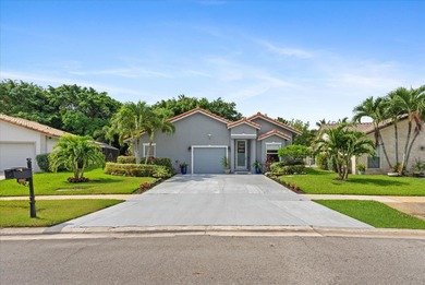 Experience luxury living in this beautiful 3 bedroom 2 bath home on Boca Greens Country Club in Florida - for sale on GolfHomes.com, golf home, golf lot