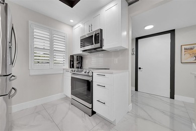 Rare fully remodeled Penthouse King model in The Oaks at Palm on Palm-Aire Country Club and Resort - The Oaks in Florida - for sale on GolfHomes.com, golf home, golf lot