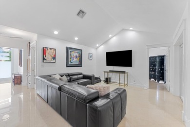 Experience luxury living in this beautiful 3 bedroom 2 bath home on Boca Greens Country Club in Florida - for sale on GolfHomes.com, golf home, golf lot