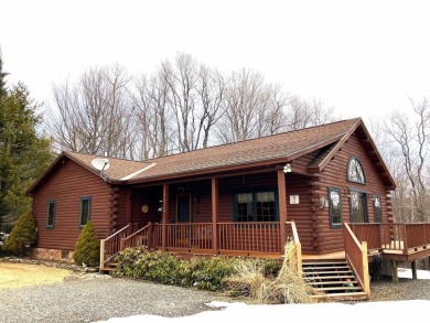 Log Home Lovers, this is your chance to have a circa 2003 log on Hermitage Club Golf Course in Vermont - for sale on GolfHomes.com, golf home, golf lot