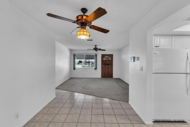 Pompano Beach Private Golf Community. 2 BR/BA with carport on Leisureville Community Association in Florida - for sale on GolfHomes.com, golf home, golf lot