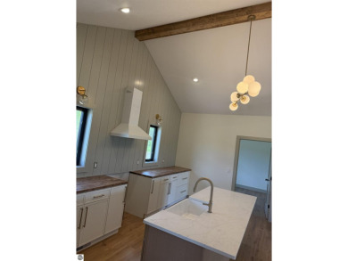 Come take a look at this brand new build with top level finishes on Mistwood Golf Course in Michigan - for sale on GolfHomes.com, golf home, golf lot