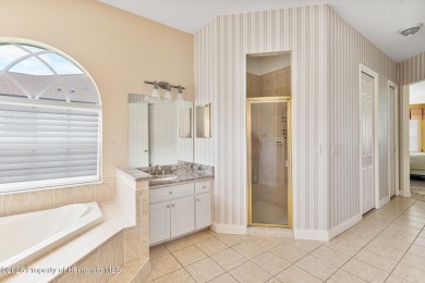 WOW! Check out this spectacular home in the HIGHLY desirable on Silverthorn Country Club in Florida - for sale on GolfHomes.com, golf home, golf lot