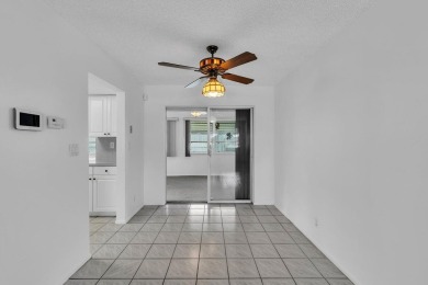 Pompano Beach Private Golf Community. 2 BR/BA with carport on Leisureville Community Association in Florida - for sale on GolfHomes.com, golf home, golf lot