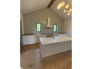 Come take a look at this brand new build with top level finishes on Mistwood Golf Course in Michigan - for sale on GolfHomes.com, golf home, golf lot