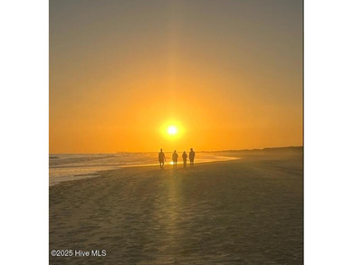 Situated in a private gated community overlooking one of Sunset on Oyster Bay Golf Links in North Carolina - for sale on GolfHomes.com, golf home, golf lot