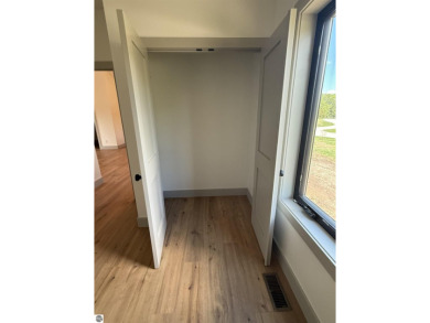 Come take a look at this brand new build with top level finishes on Mistwood Golf Course in Michigan - for sale on GolfHomes.com, golf home, golf lot