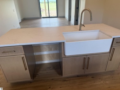 Come take a look at this brand new build with top level finishes on Mistwood Golf Course in Michigan - for sale on GolfHomes.com, golf home, golf lot