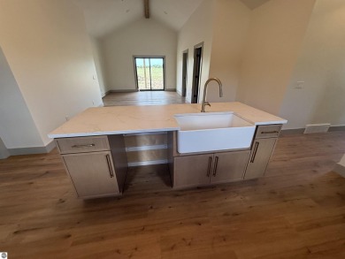 Come take a look at this brand new build with top level finishes on Mistwood Golf Course in Michigan - for sale on GolfHomes.com, golf home, golf lot