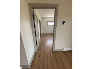 Come take a look at this brand new build with top level finishes on Mistwood Golf Course in Michigan - for sale on GolfHomes.com, golf home, golf lot
