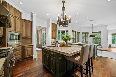 Tucked along the Rock Creek Golf Course in Fairhope, this on Rock Creek Golf Club in Alabama - for sale on GolfHomes.com, golf home, golf lot