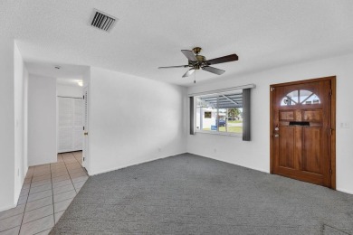 Pompano Beach Private Golf Community. 2 BR/BA with carport on Leisureville Community Association in Florida - for sale on GolfHomes.com, golf home, golf lot