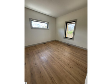 Come take a look at this brand new build with top level finishes on Mistwood Golf Course in Michigan - for sale on GolfHomes.com, golf home, golf lot