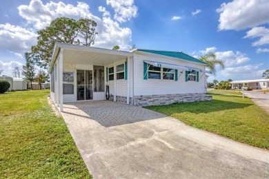 Check out this charming home where you own your own land in the on Sabal Trace Golf and Country Club in Florida - for sale on GolfHomes.com, golf home, golf lot