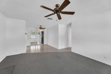 Pompano Beach Private Golf Community. 2 BR/BA with carport on Leisureville Community Association in Florida - for sale on GolfHomes.com, golf home, golf lot