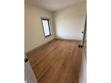 Come take a look at this brand new build with top level finishes on Mistwood Golf Course in Michigan - for sale on GolfHomes.com, golf home, golf lot
