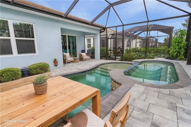 LOWEST PRICED POOL SPA HOME IN SEASONS AT BONITA, A NEW on Bonita National Golf Course in Florida - for sale on GolfHomes.com, golf home, golf lot