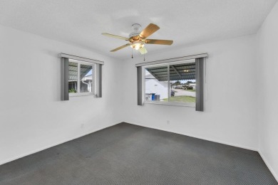 Pompano Beach Private Golf Community. 2 BR/BA with carport on Leisureville Community Association in Florida - for sale on GolfHomes.com, golf home, golf lot