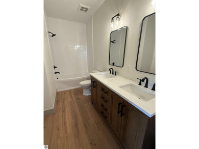 Come take a look at this brand new build with top level finishes on Mistwood Golf Course in Michigan - for sale on GolfHomes.com, golf home, golf lot