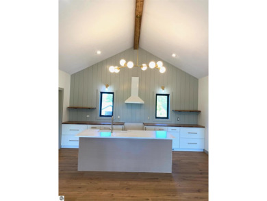 Come take a look at this brand new build with top level finishes on Mistwood Golf Course in Michigan - for sale on GolfHomes.com, golf home, golf lot