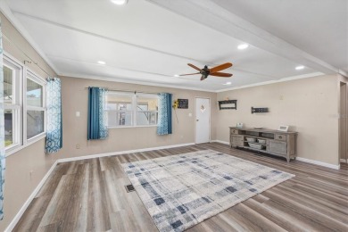 Check out this charming home where you own your own land in the on Sabal Trace Golf and Country Club in Florida - for sale on GolfHomes.com, golf home, golf lot