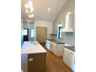 Come take a look at this brand new build with top level finishes on Mistwood Golf Course in Michigan - for sale on GolfHomes.com, golf home, golf lot