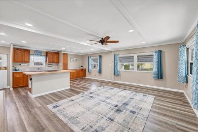 Check out this charming home where you own your own land in the on Sabal Trace Golf and Country Club in Florida - for sale on GolfHomes.com, golf home, golf lot