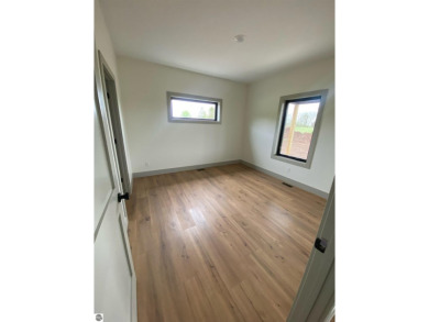 Come take a look at this brand new build with top level finishes on Mistwood Golf Course in Michigan - for sale on GolfHomes.com, golf home, golf lot