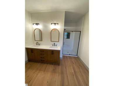 Come take a look at this brand new build with top level finishes on Mistwood Golf Course in Michigan - for sale on GolfHomes.com, golf home, golf lot