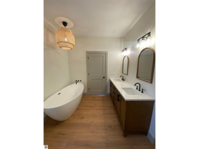 Come take a look at this brand new build with top level finishes on Mistwood Golf Course in Michigan - for sale on GolfHomes.com, golf home, golf lot