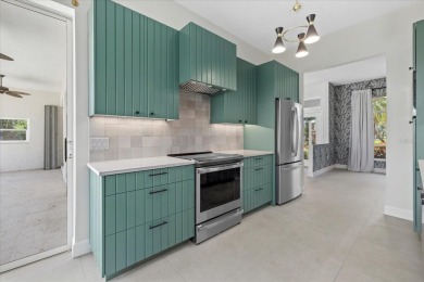 COMMUNITY POOL. MAINTENANCE FREEPLETELY RENOVATED.  HURRICANE on Calusa Lakes Golf Club in Florida - for sale on GolfHomes.com, golf home, golf lot