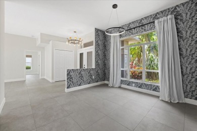 COMMUNITY POOL. MAINTENANCE FREEPLETELY RENOVATED.  HURRICANE on Calusa Lakes Golf Club in Florida - for sale on GolfHomes.com, golf home, golf lot