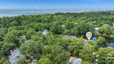 First-floor coastal retreat with vast lagoon views from all on Shipyard Golf Club in South Carolina - for sale on GolfHomes.com, golf home, golf lot