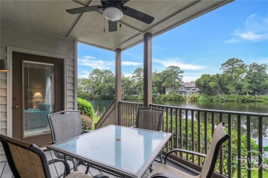 First-floor coastal retreat with vast lagoon views from all on Shipyard Golf Club in South Carolina - for sale on GolfHomes.com, golf home, golf lot