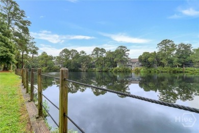 First-floor coastal retreat with vast lagoon views from all on Shipyard Golf Club in South Carolina - for sale on GolfHomes.com, golf home, golf lot