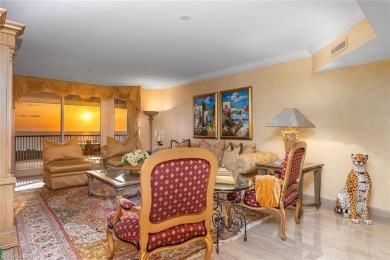 This Tuscany inspired 3-bedroom, 3-bath luxury tower residence on Club at Pelican Bay Golf Course in Florida - for sale on GolfHomes.com, golf home, golf lot